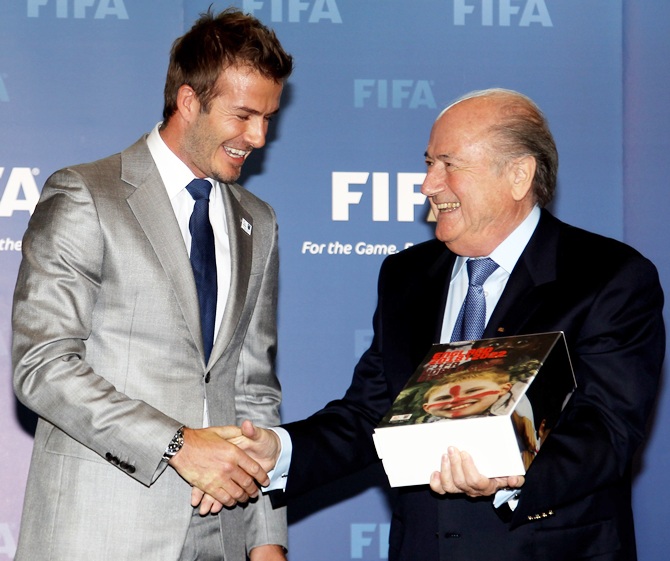 David Beckham, England 2018 Vice President hands England's Bid book to Sepp Blatter, President of   FIFA