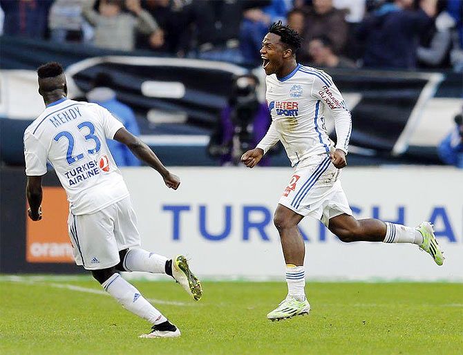 Olympique Marseille's Michy Batshuayi (right) celebrates with teammate Benjamin Mendy after scoring against Lille during their French Ligue 1 match at the Velodrome stadium in Marseille, on Sunday