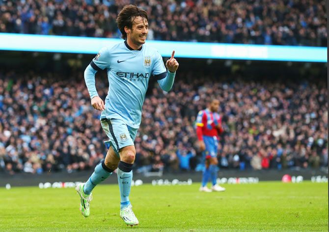 David Silva of Manchester City celebrates scoring his team's second goal against Crystal Palace during their English Premier League match at Etihad Stadium in Manchester on Saturday