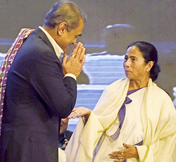 West Bengal Chief Minister Mamata Banerjee with All India Football Federation president Praful Patel