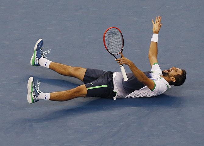 Marin Cilic of Croatia celebrates after defeating Kei Nishikori of Japan to win the US Open men's singles final in New York on September 8