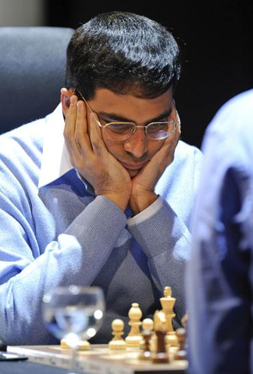 World champion Viswanathan Anand from India contemplates his next move  during the 11th game of the Chess World Championship against Russia's  Vladimir Kramnik in the Art and Exhibition Hall of the Federal