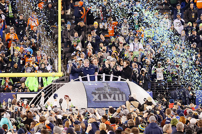 Head coach Pete Carroll of the Seattle Seahawks celebrates their 43 to 8 win over the Denver Broncos during Super Bowl XLVIII at MetLife Stadium in East Rutherford, New Jersey on Sunday