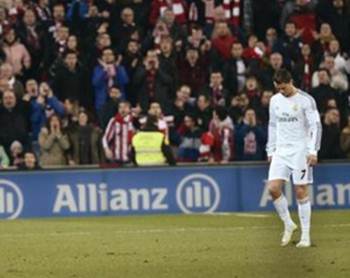 Real Madrid's Cristiano Ronaldo reacts after receiving a red card during their Spanish first division soccer match against Athletic Bilbao at San Mames stadium in Bilbao February 2
