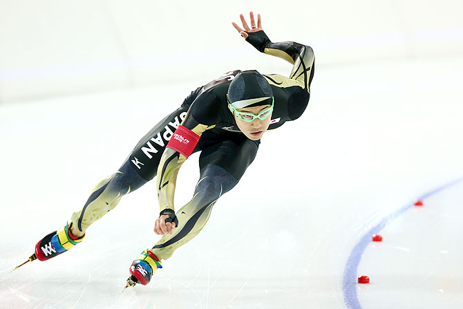 Speed Skater Joji Kato of Japan skates during a training session ahead of the Sochi 2014 Winter Olympics at Adler Arena Skating Centre in Sochi
