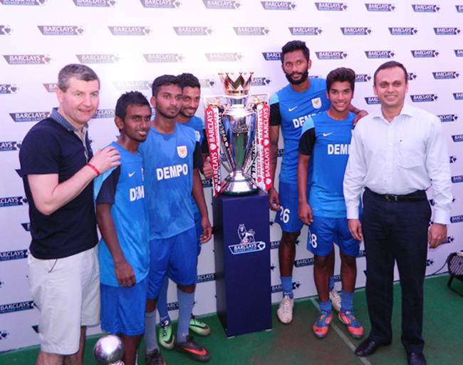 Denis Irwin (left), Shrinivas Dempo (extreme right) and Dempo SC players with the  Barclay's Premier League trophy