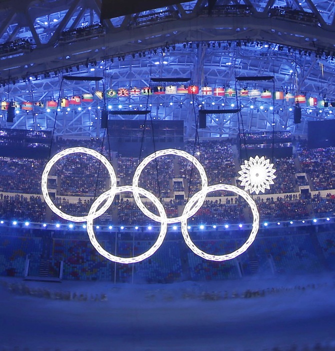 Four of five Olympic Rings are seen lit up during the opening ceremony of the 2014 Sochi Winter Olympics