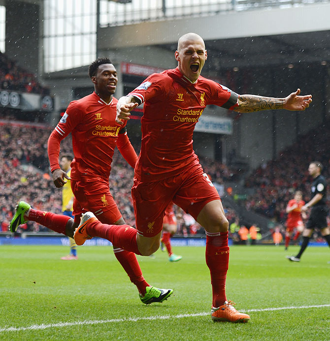 Martin Skrtel of Liverpool celebrates scoring the opening goal against Arsenal on Saturday