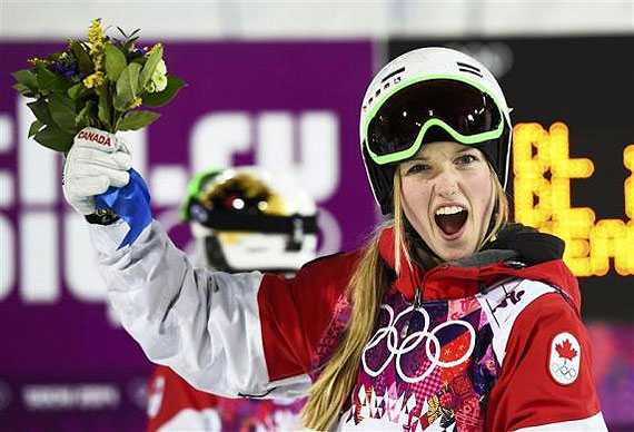 Canada's Justine Dufour-Lapointe celebrates victory after the women's freestyle skiing moguls final on Saturday