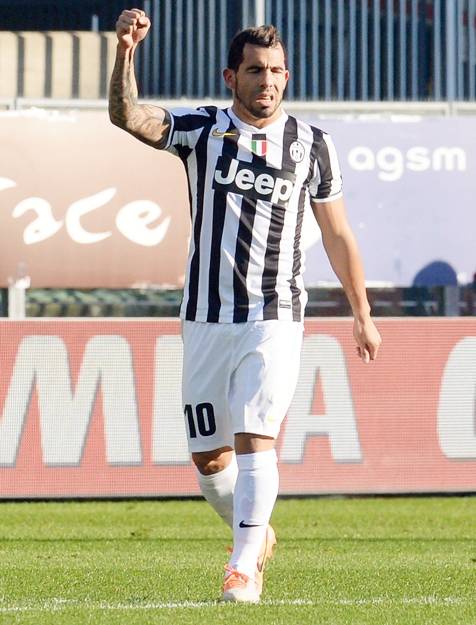 Carlos Tevez of Juventus celebrates after scoring his opening goal.