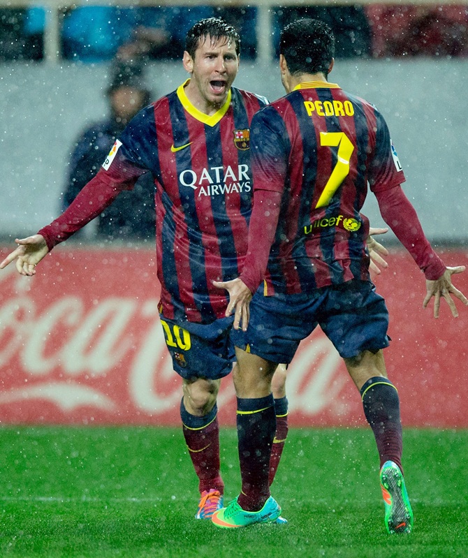 Lionel Messi of FC Barcelona celebrates scoring their second goal.