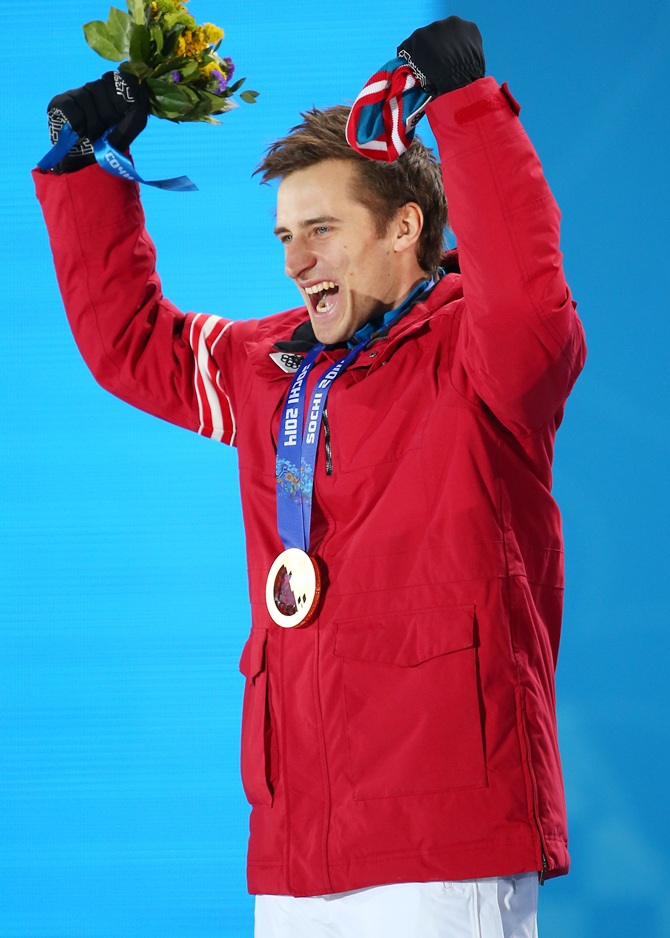 Gold medalist Matthias Mayer of Austria celebrates during the medal ceremony.