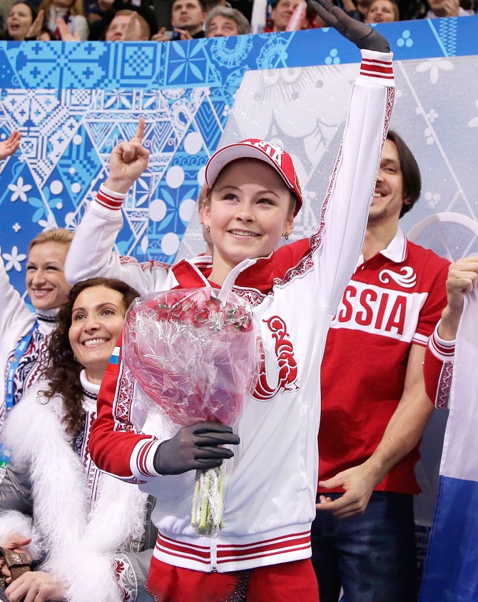 Julia Lipnitskaya of Russia reacts to her score in the Team Ladies Free Skating.