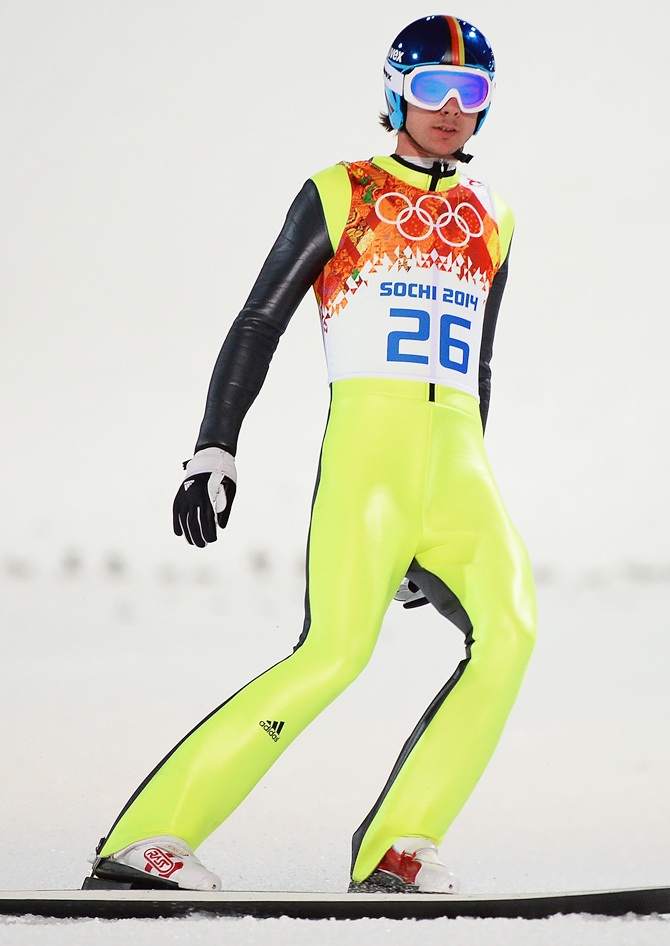 Andreas Wank of Germany lands his jump during the Men's Normal Hill Individual.