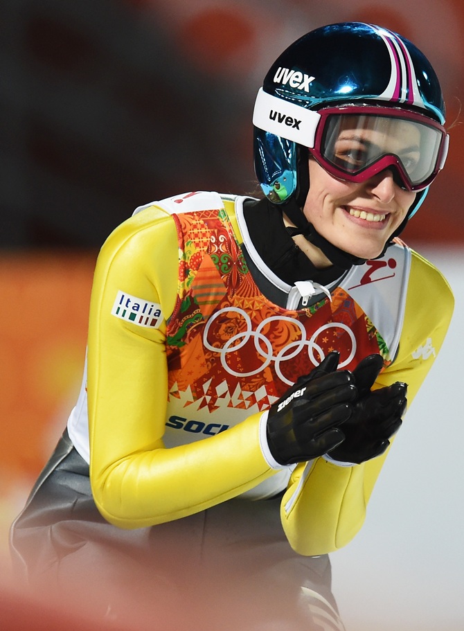Evelyn Insam of Italy smiles during the Ladies' Normal Hill Individual.
