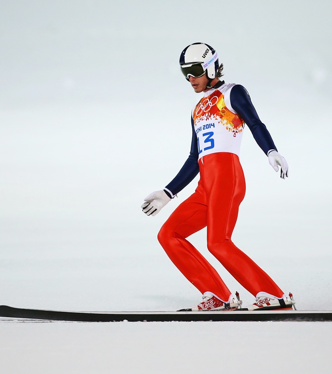 Anders Johnson of the United States lands after a jump during the Men's Normal Hill Individual Qualification.