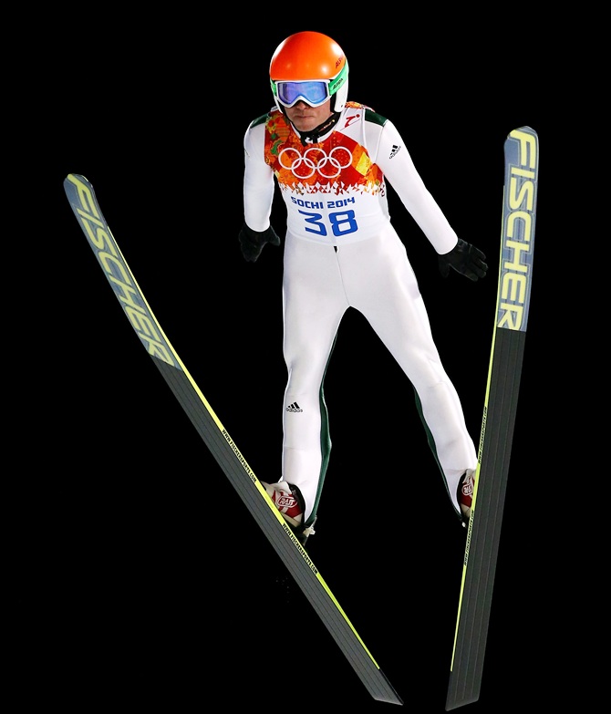 Jernej Damjan of Slovenia jumps during the Men's Normal Hill Individual.