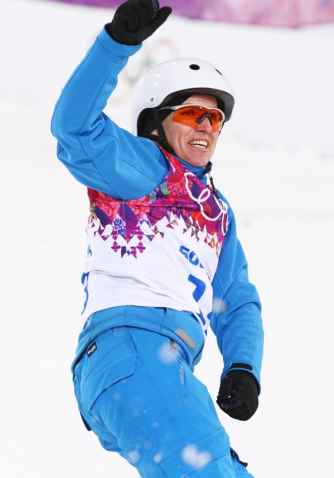 Alla Tsuper of Belarus celebrates after her run in the Freestyle Skiing Ladies' Aerials Finals.