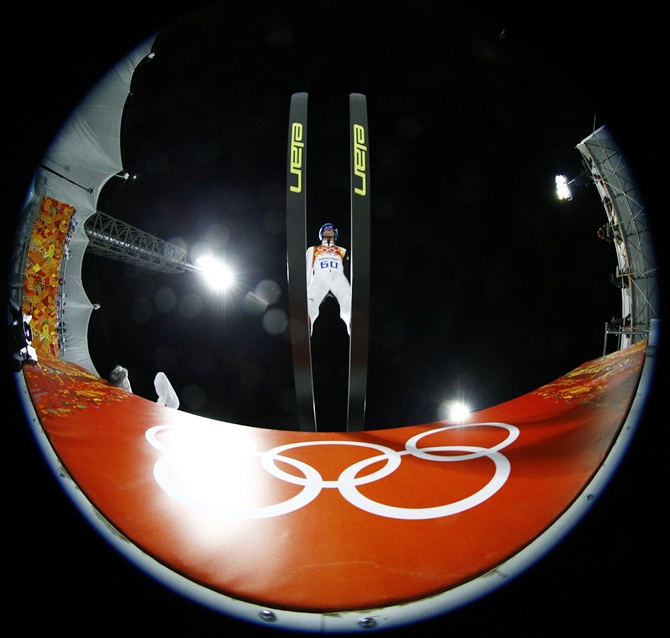 Slovenia's Peter Prevc takes off during his trial jump in the men's ski jumping large hill individual qualification round.