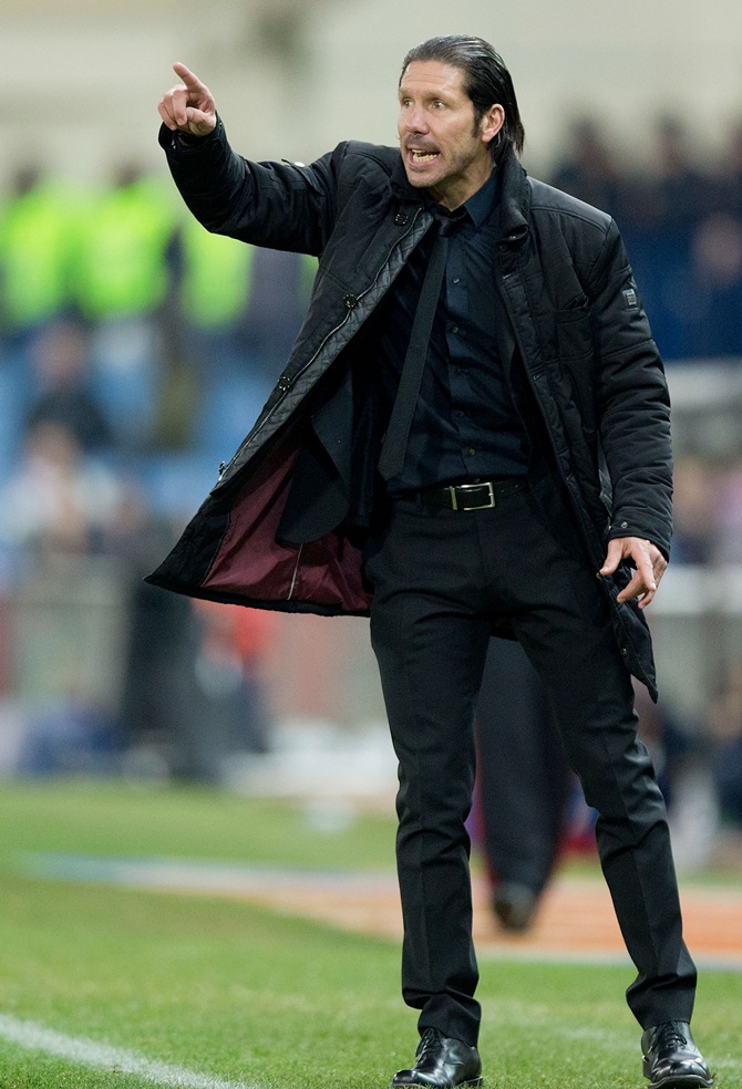 Head coach Diego Simeone of Atletico de Madrid gives instructions.