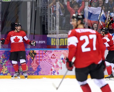 Ice hockey: Canada, US advance; Russia sweats