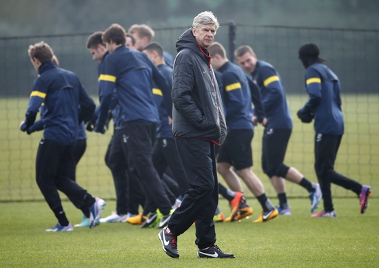 Arsenal manager Arsene Wenger attends a team training session.