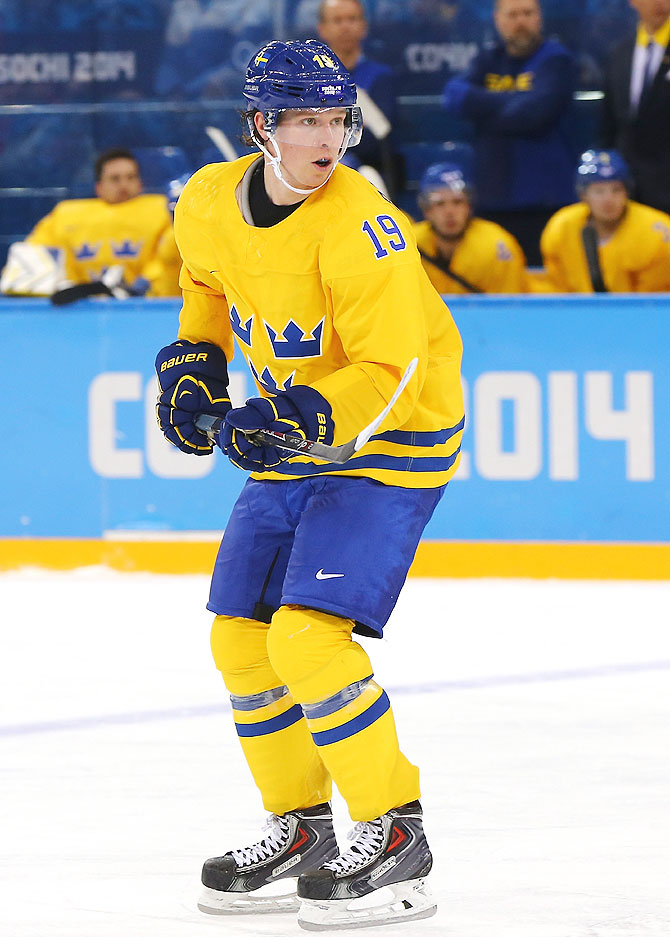 Nicklas Backstrom #19 of Sweden skates against Latvia