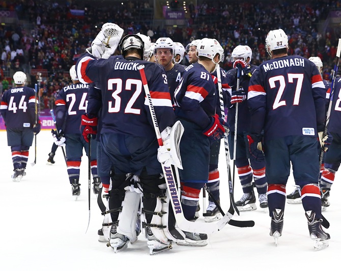 The United States players react after losing to Finland.