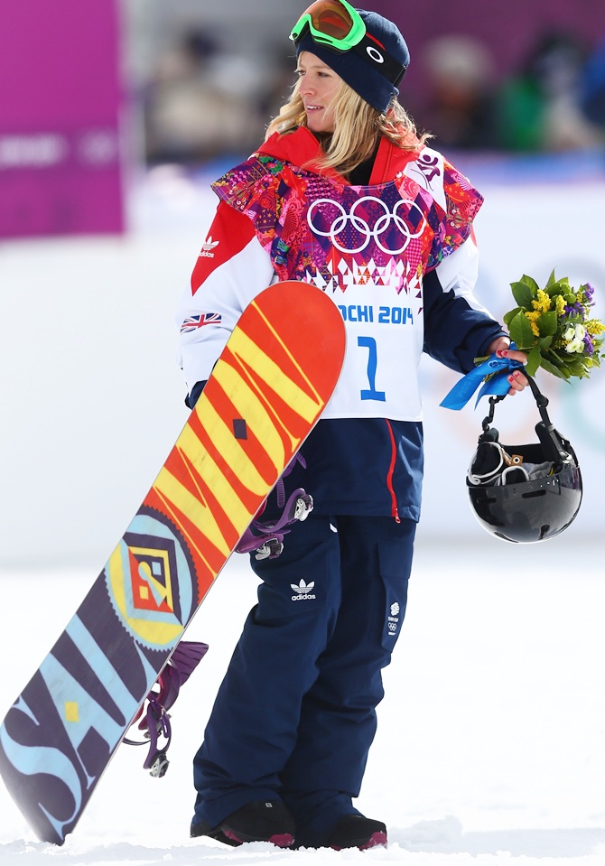Bronze medalist Jenny Jones of Great Britain celebrates during the flower ceremony for the Women's Snowboard Slopestyle Finals.