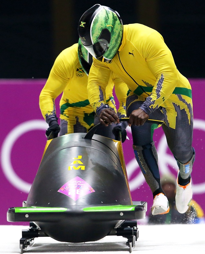Pilot Winston Watts and Marvin Dixon of Jamaica team 1 make a run during the Men's Two-Man Bobsleigh heats.
