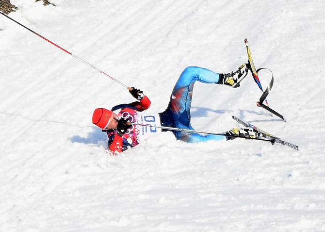 Anton Gafarov of Russia collapses in the Finals of the Men's Sprint Free.