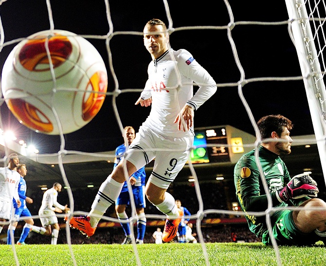 Roberto Soldado of Tottenham Hotspur watches the ball hit the back of the net after Christian Eriksen of Tottenham Hotspur (not pictured) scores the first goal.