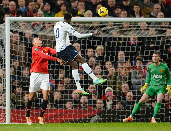 Emmanuel Adebayor of Tottenham Hotspur scores the opening goal