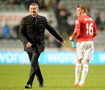 Ole Gunnar Solskjaer the Cardiff manager celebrates with Craig Noone of Cardiff following their team's 2-1 FA Cup victory over Newcastle United at St James' Park in Newcastle upon Tyne, on Saturday