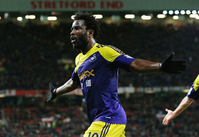Wilfried Bony of Swansea City celebrates scoring his team's second goal during the FA Cup against Manchester United at Old Trafford on Sunday