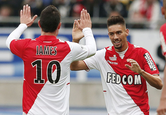 AS Monaco's Yannick Ferreira Carrasco is congratulated by his team-mate James Rodriguez (left) after scoring