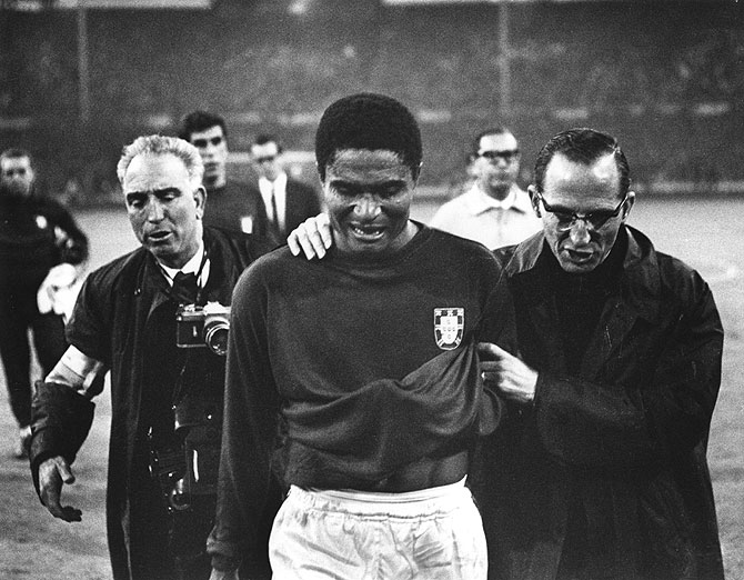 Eusebio leaves the pitch in tears after England beat Portugal 2-1 in the 1966 World Cup sem-finals at Wembley Stadium