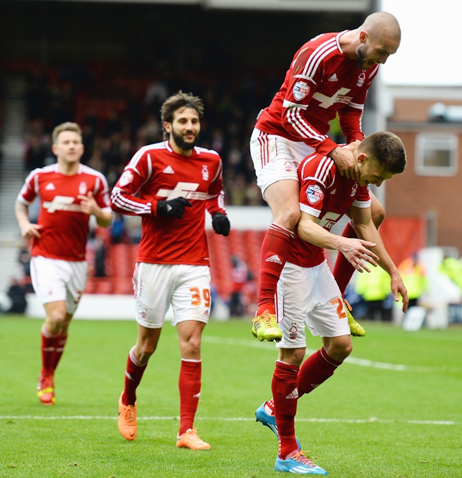 Jamie Paterson of Nottingham Forest celebrates scoring his third goal with Henri Lansbury