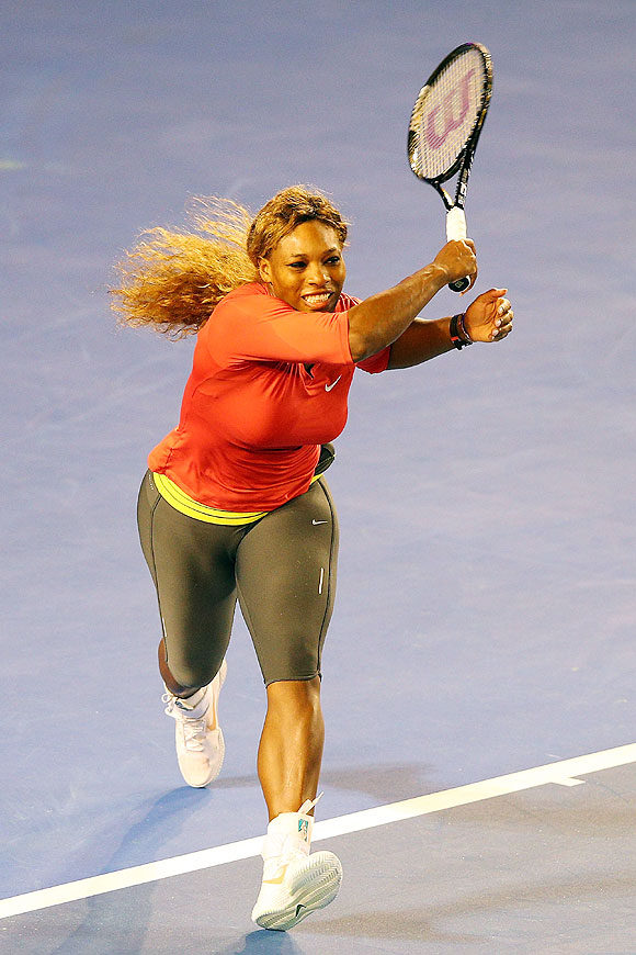 Serena Williams of the USA hits a forehand during a practice session ahead of the 2014 Australian Open at Melbourne Park on Monday