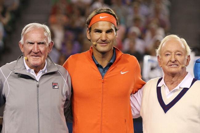 Australian tennis legends Tony Roche (left) and Rod Laver pose with Roger Federer