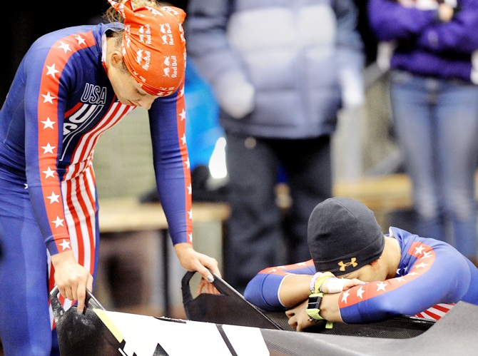 Brakewoman Lolo Jones and her bobsled pilot Jazmine Fenlator react to their third place finish during the bobsled selection runs