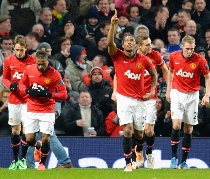 Luis Antonio Valencia of Manchester United celebrates scoring the opening goal