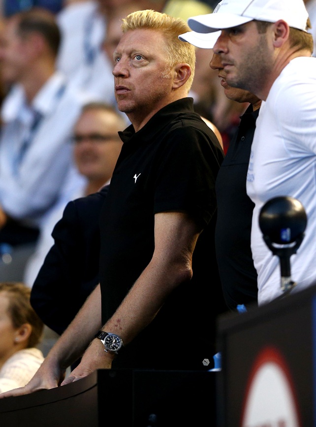 Coach of Novak Djokovic of Serbia, Boris Becker watches on in his first round match against Lukas Lacko of Slovakia