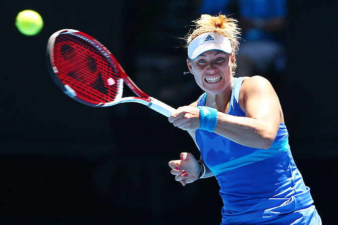 Angelique Kerber of Germany plays a forehand against Jarmila Gajdosova of Australia in their first round match of the Australian Open at Melbourne Park on Monday