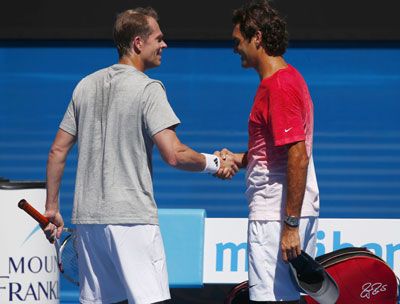Roger Federer of Switzerland and coach Stefan Edberg of Sweden at a practice session at the Australian Open in Melbourne on Tuesday