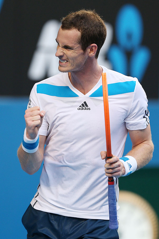 Andy Murray of Great Britain celebrates winning a point in his first round match against Go Soeda of Japan on Tuesday