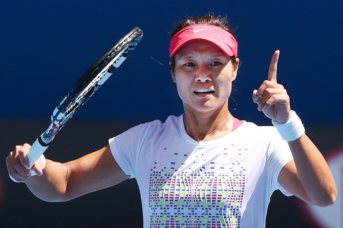 Li Na of China gestures during a training session