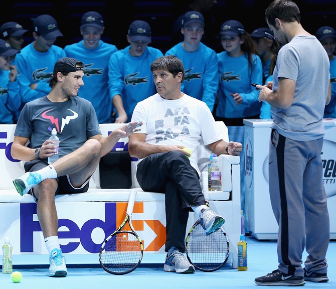 Rafael Nadal of Spain with his coach Toni Nadal