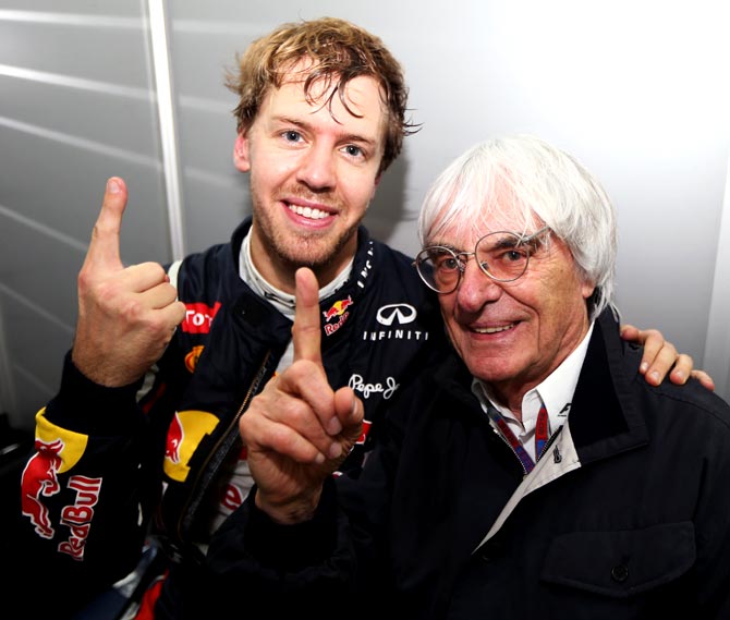 Bernie Ecclestone (right) with Sebastian Vettel