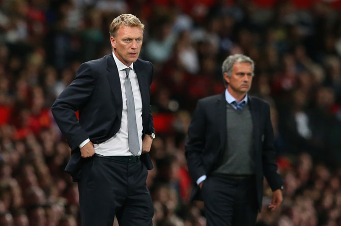 Manchester United manager David Moyes and Chelsea manager Jose Mourinho during the clash at Old Trafford in August